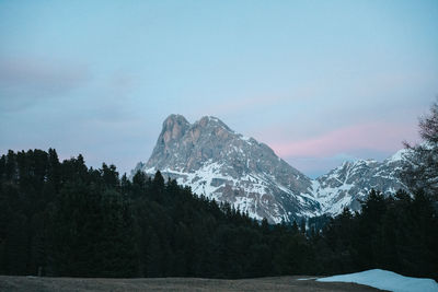 Scenic view of snowcapped mountains against sky during winter