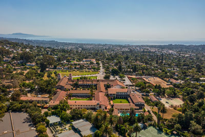 High angle view of buildings in city against sky