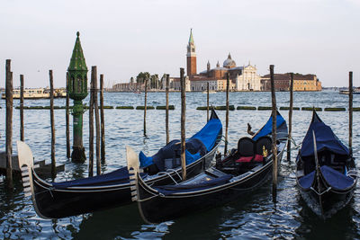 Boats moored in canal