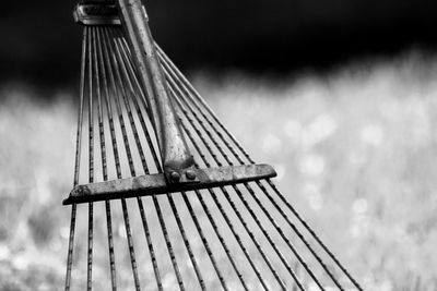 Close-up of metal against sky