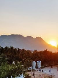 Scenic view of mountains against sky during sunset