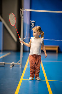 Boy playing tennis