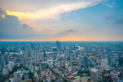 High angle view of modern buildings against sky in city