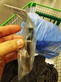 Close-up of hand holding ice cream