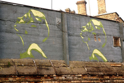 Low angle view of graffiti on wall