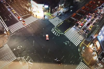 High angle view of vehicles on road at night