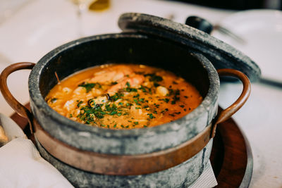 National cuisine of cape verde cachupa in traditional stone bowl.