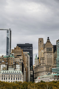 Buildings in city against sky