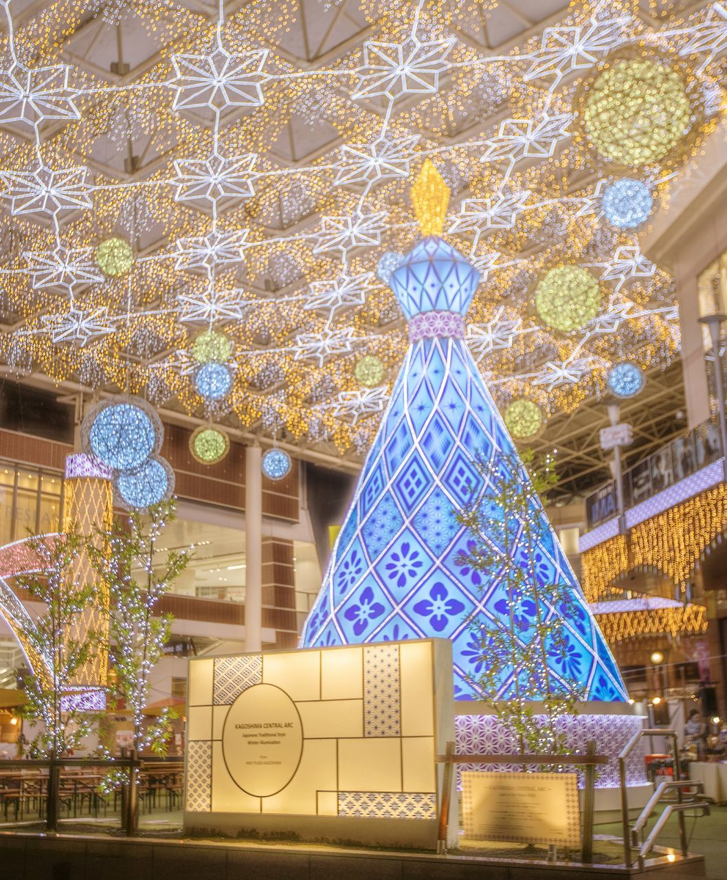 LOW ANGLE VIEW OF CHRISTMAS DECORATION HANGING ON TREE