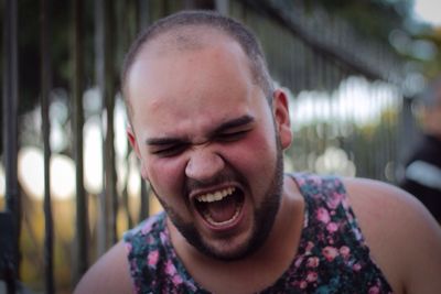 Close-up of young man screaming