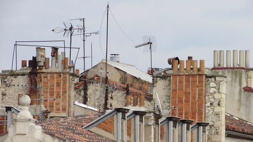 Text on roof against sky