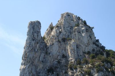 Low angle view of mountain against clear sky