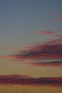 Low angle view of dramatic sky during sunset