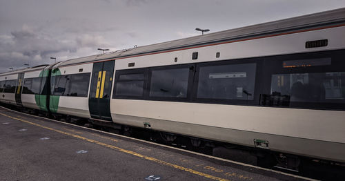 Train on railroad station platform against sky