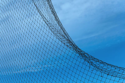 Low angle view of basketball hoop against sky