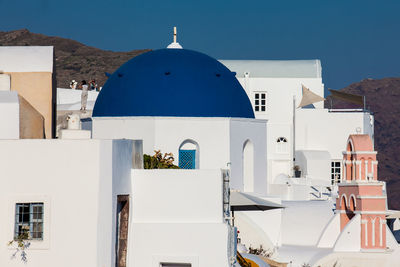 Traditional architecture of the churches of the oia city in santorini island