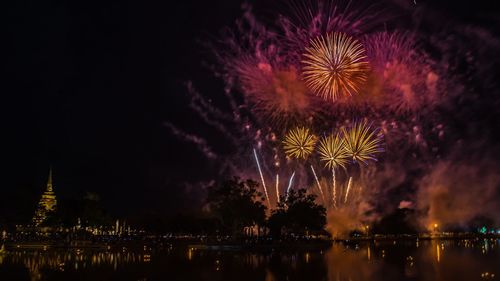 Firework display at night