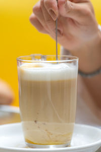 Close-up of coffee cup on table