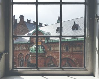 Buildings seen through window