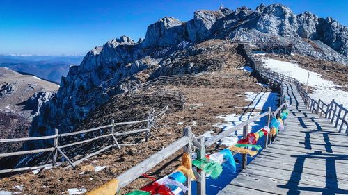 High angle view of snowcapped mountains against sky, lijiang, shanghai-la 