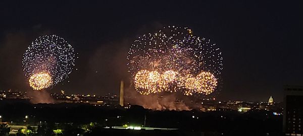 Firework display at night