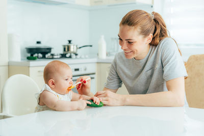 Mother and daughter at home