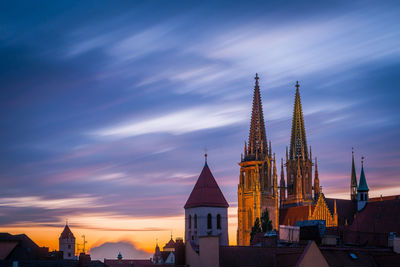 View of buildings against sky at sunset