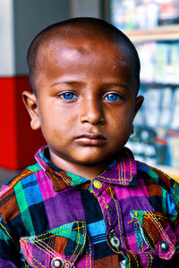 Portrait of cute boy with blue eyes