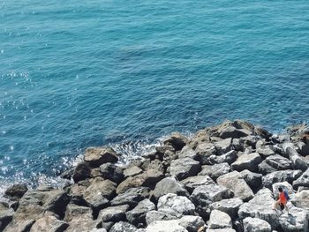 High angle view of rocks on beach