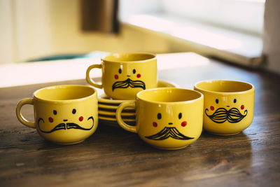 Close-up of tea cup on table