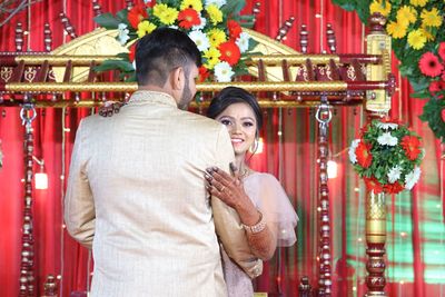 Rear view of couple standing outdoors