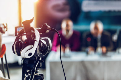 Close-up of camera with headphones