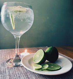 Close-up of drink with lime on table