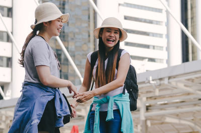 Tourists standing in city