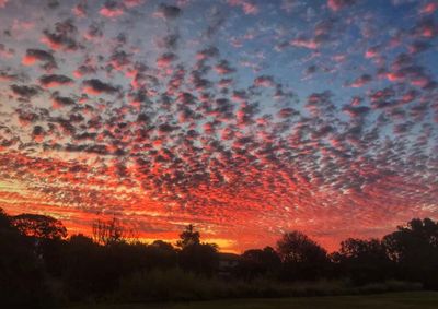 Scenic view of dramatic sky during sunset