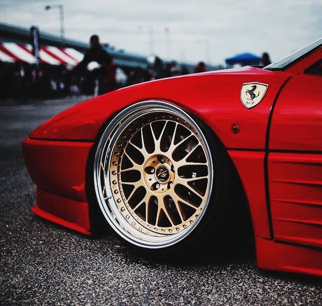 red, car, tire, wheel, no people, close-up, outdoors, day