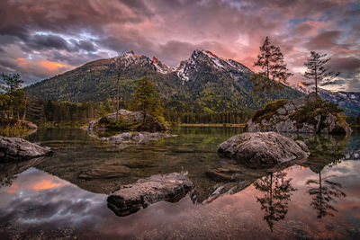 Scenic view of lake against sky during sunset