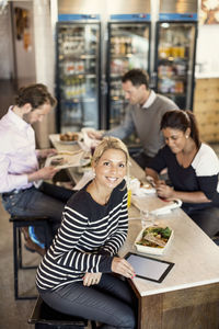 Young woman sitting in restaurant