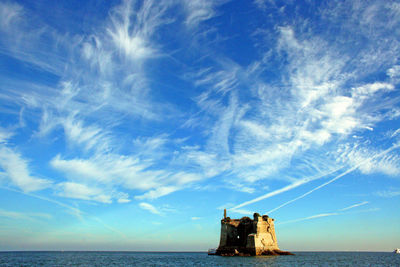 Scenic view of sea against blue sky