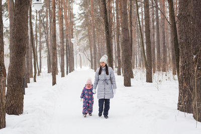 Woman on snow covered land