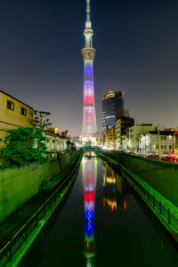 Illuminated tokyo sky tree in city at night