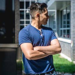 Young man standing outdoors