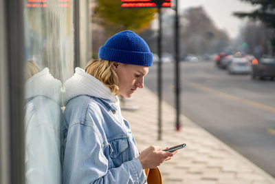 Young woman using mobile phone