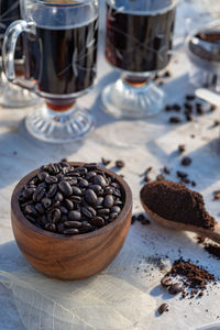 Still life with coffee beans, wooden spoon, making coffee at home