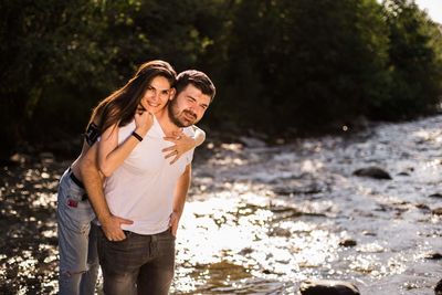 Young couple standing outdoors