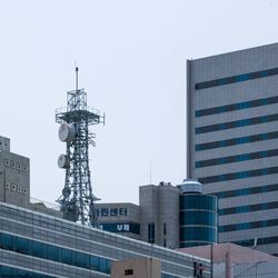 Low angle view of modern buildings against clear sky