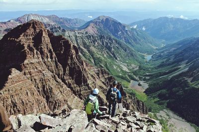 High angle view of hikers on mountains