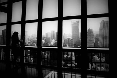 View of cityscape through window