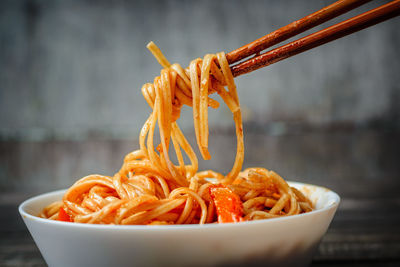 Close-up of noodles in bowl on table