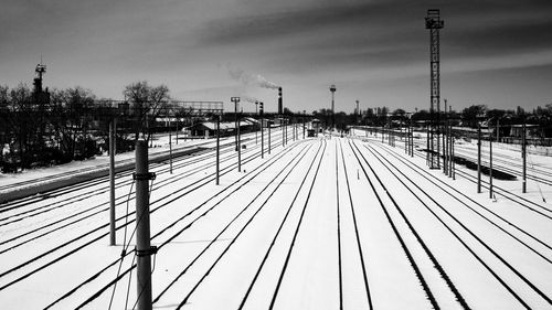 High angle view of railroad tracks against sky during winter